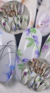 Modèles de Nail Art floral et graphique réalisés à la peinture aquarelle, issus de la formation de la Sylvia Da Cruz Academy.